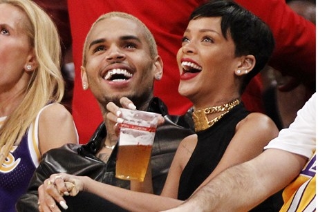 Chris Brown & Rihanna at a sports game